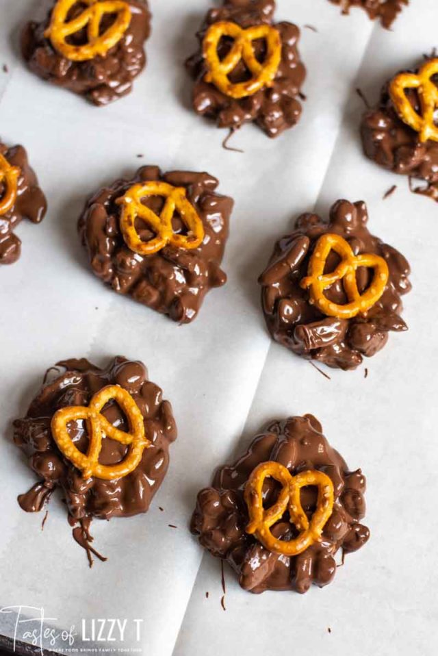 chocolate candies with pretzels on parchment paper