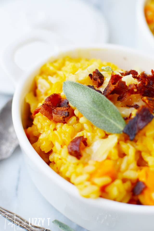 A close up of a bowl of food on a plate, with Potato and Risotto