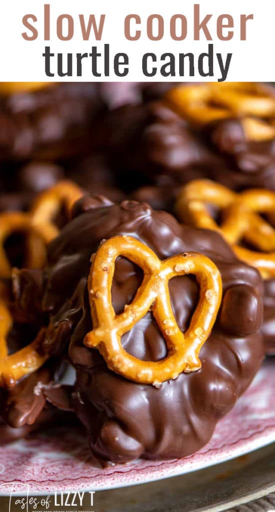 A close up of a chocolate candy with pretzel