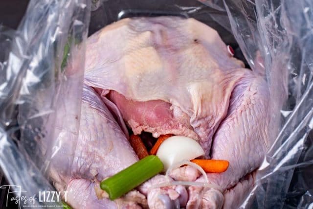 uncooked turkey in a cooking bag