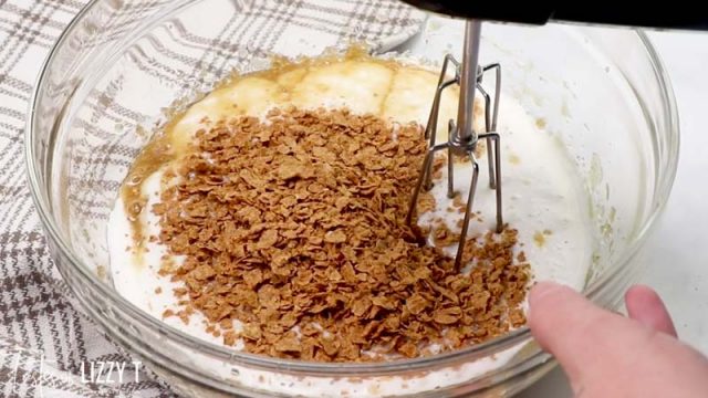 mixing bran flakes into muffin batter