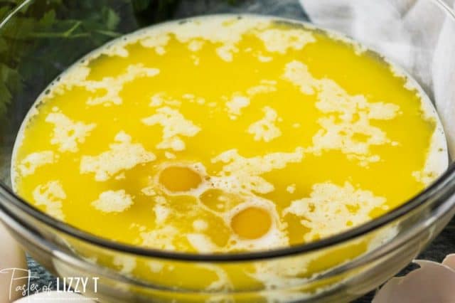melted butter and eggs in a bowl