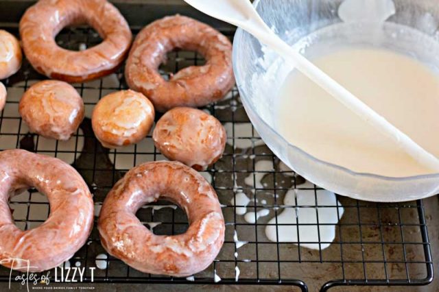 bowl of glaze with homemade donuts