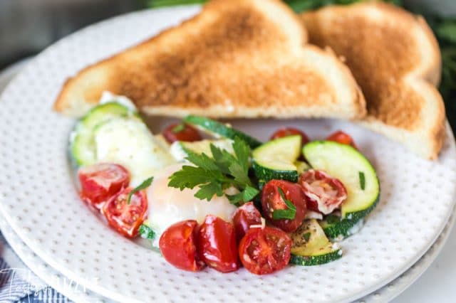 egg bake with vegetables on a plate with toast