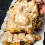 hand holding cinnamon scones