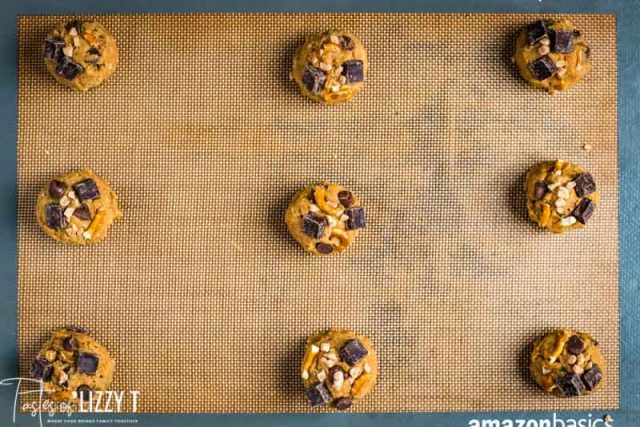 unbaked cookies on baking mat