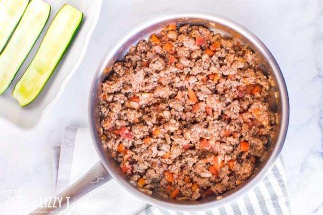 ground sausage and peppers in a skillet