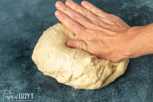 hand kneading bread dough