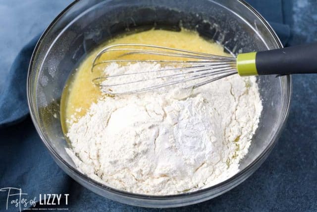 dry ingredients on top of wet ingredients in a bowl