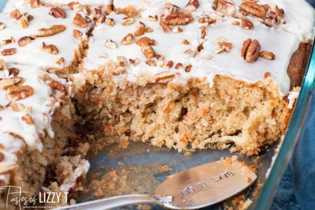 frosted carrot cake in a baking pan