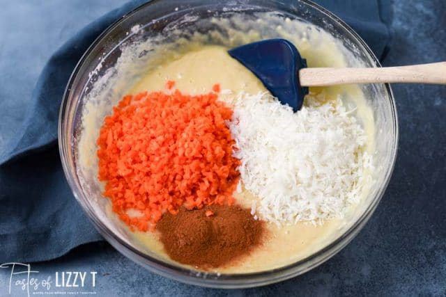 carrots, coconut and cinnamon on cake batter