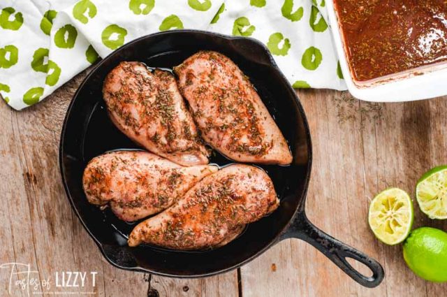 marinated chicken in a cast iron skillet