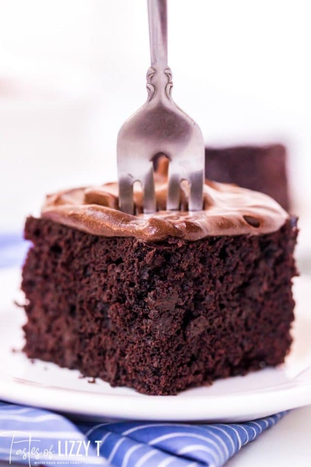 slice of chocolate crazy cake with a fork in it