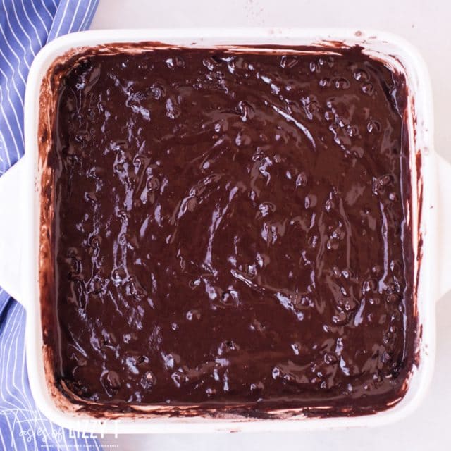 unbaked crazy cake in square pan