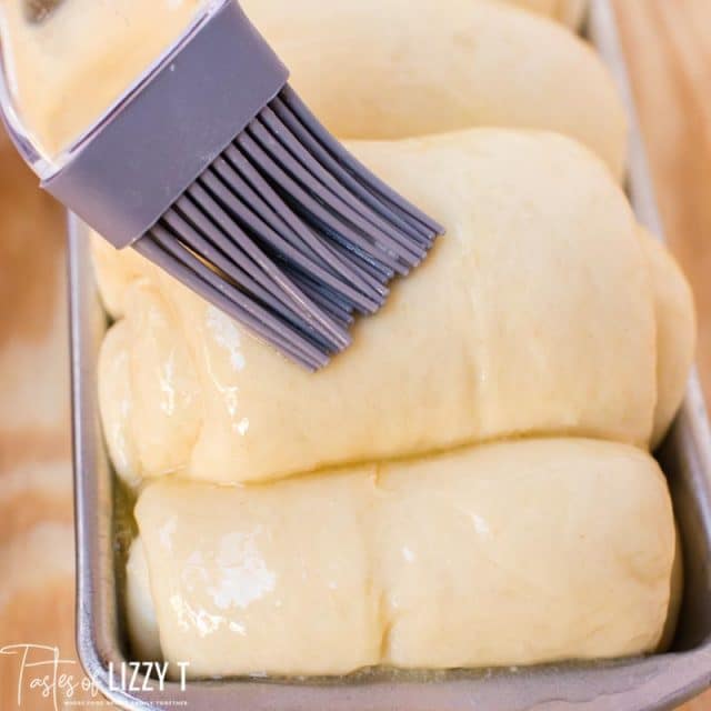 pastry brush brushing butter on milk bread