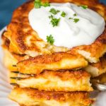 homemade potato cakes with fork on a plate