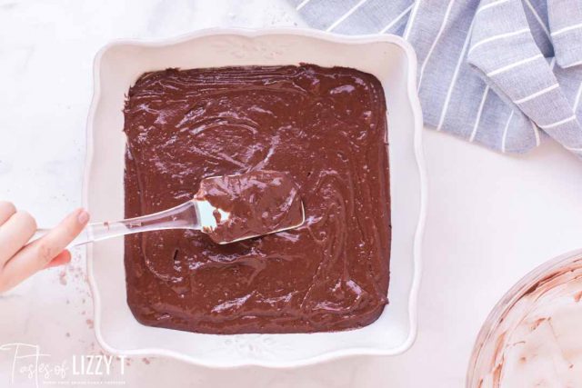 chocolate cake batter in a 9x9 baking pan.