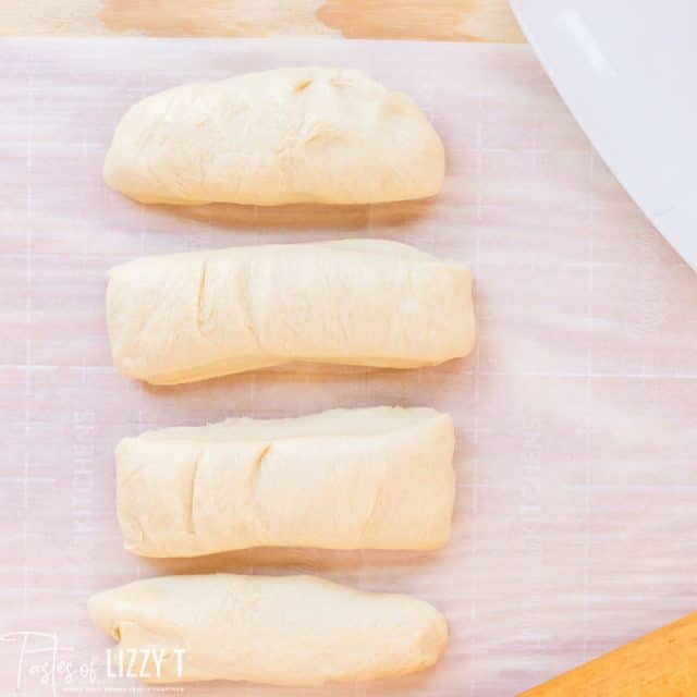 cut dough into four pieces