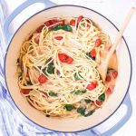 overhead shot of pasta and tomatoes in a pot