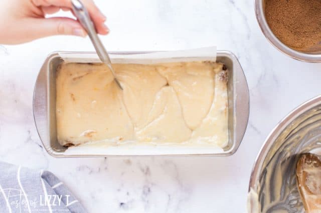 swirling cinnamon roll quick bread batter with a knife