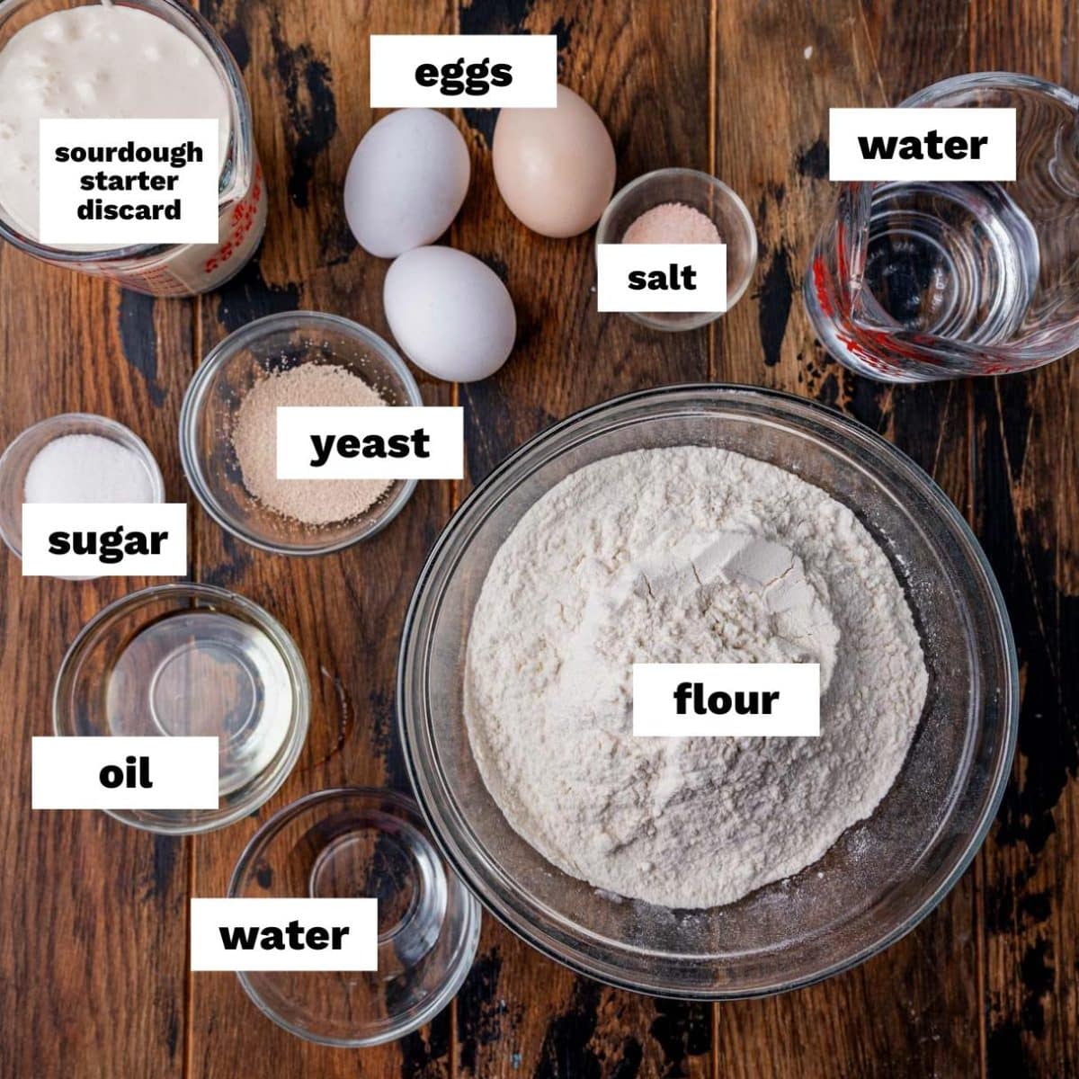 ingredients for sourdough rolls on a table