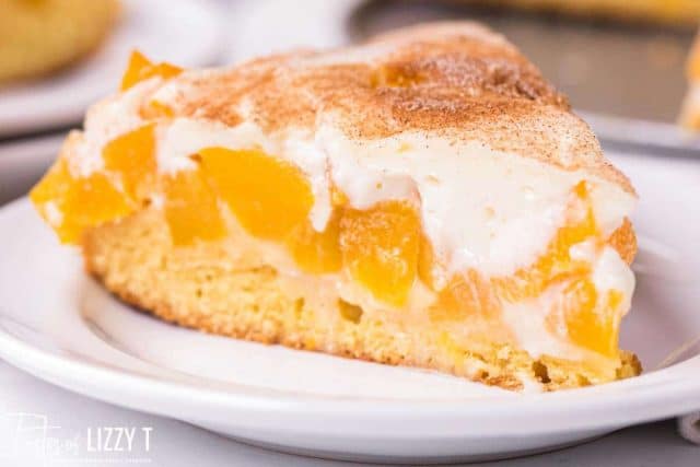 slice of peaches and cream cake on a plate