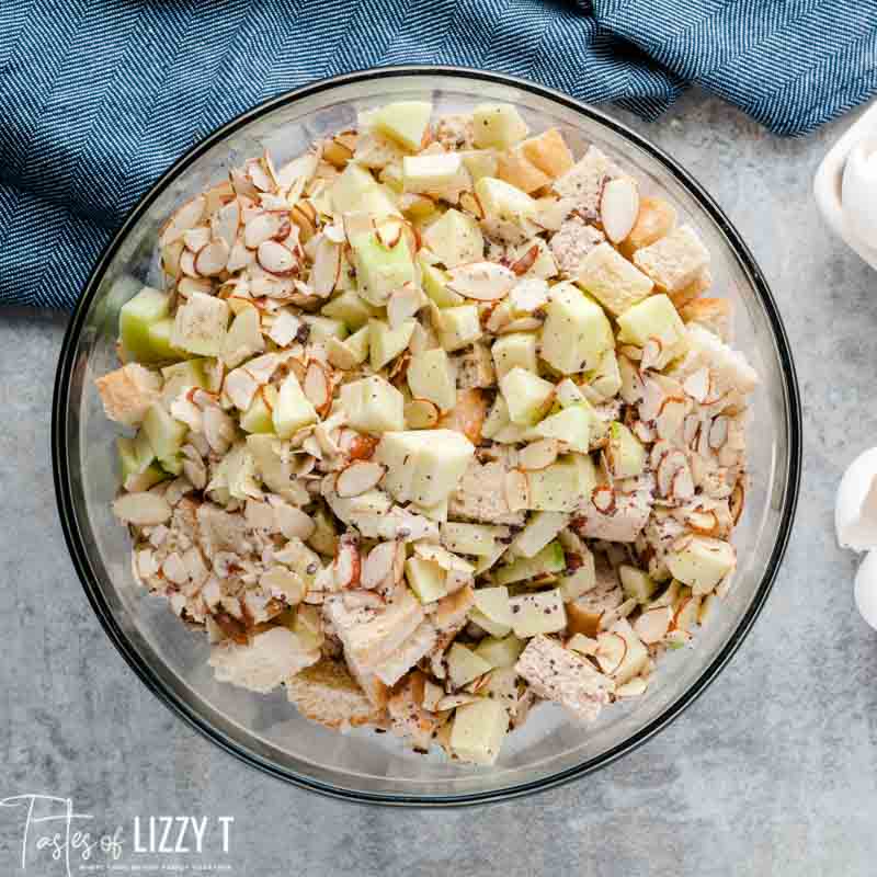 ingredients for apple bread pudding in a bowl