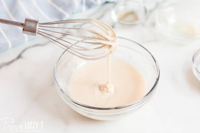 glaze in a bowl with a whisk