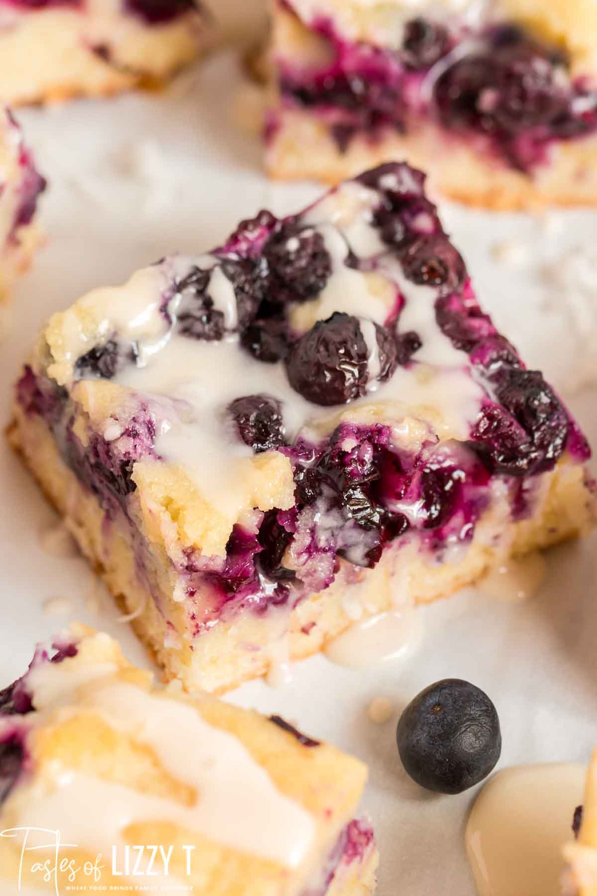 Blueberry Coconut Bars {with Vanilla Coconut Glaze} | Tastes of Lizzy T