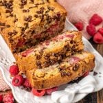 loaf of chocolate chip raspberry bread on a plate