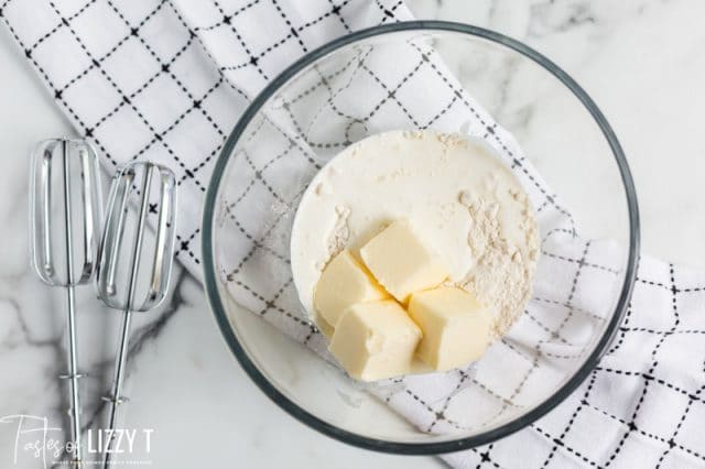 flour, butter and cream in a bowl