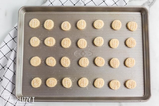 unbaked cookies on a baking sheet