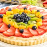 fresh fruit piled on a shortbread crust