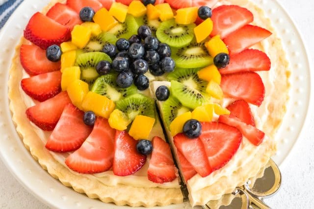 slice of a fruit tart on a spatula