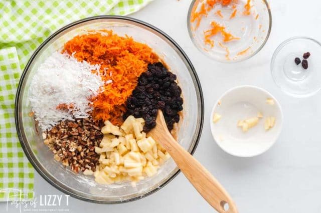 morning glory muffins batter with carrots, apples, raisins, walnuts and coconut