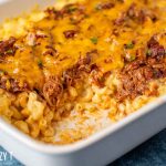 pulled pork mac and cheese in a casserole