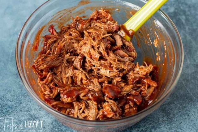 pulled pork and barbecue sauce in a bowl