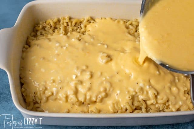 cheese pouring over macaroni noodles