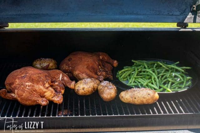 whole chicken dinner on smoker grill