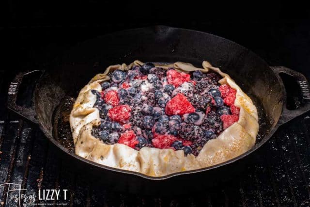 triple berry galette on a skillet