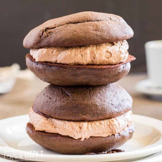 two mocha whoopie pies stacked on each other