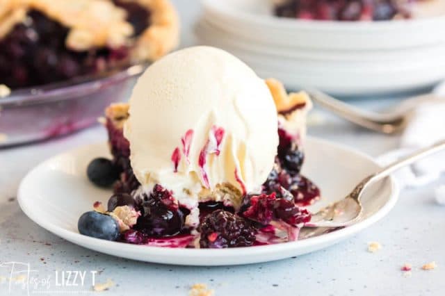Blueberry Blackberry Pie with ice cream on top