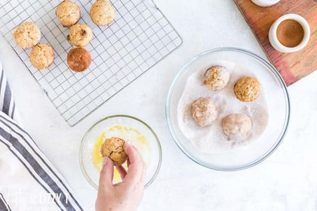 rolling muffins in butter and sugar