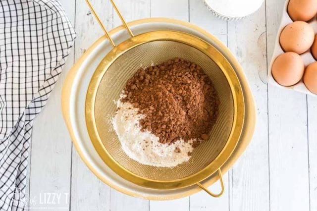 sifting dry ingredients for chocolate cake