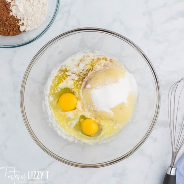 butter, eggs and sugar in a bowl