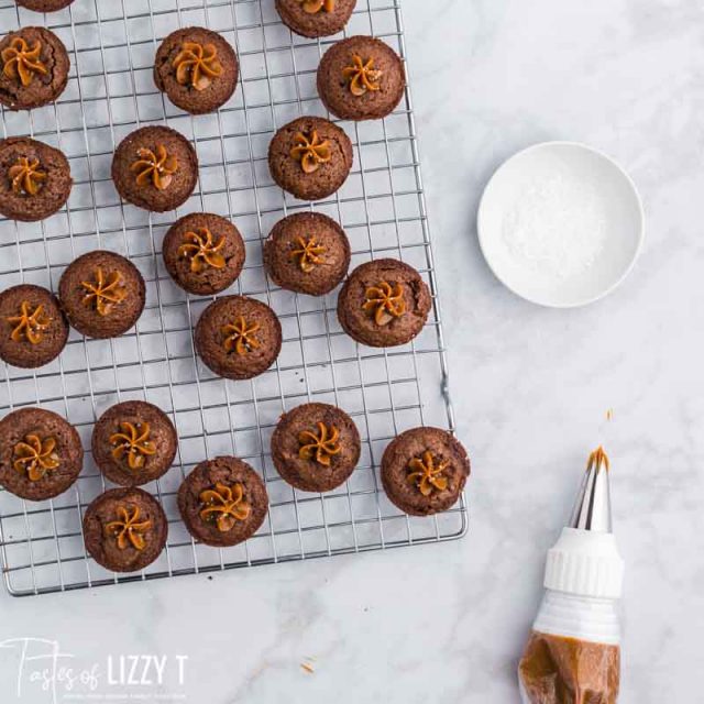 caramel filled brownies on a wire rack