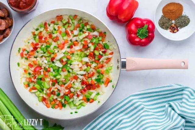 roasted peppers and onions in a skillet