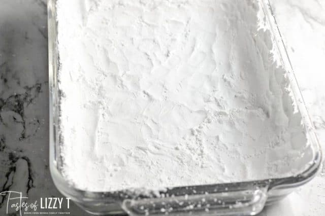 powdered sugar in a 9x13 pan
