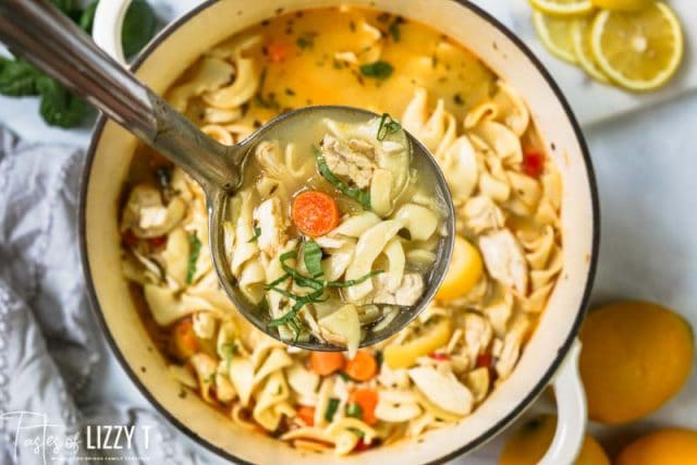 chicken soup in a ladle