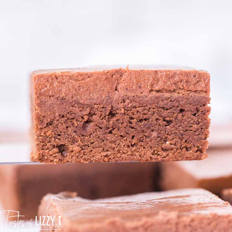 frosted brownie on a spatula